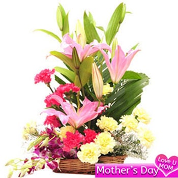 Basket of lilies, carnations and orchids